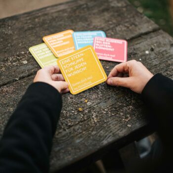 Gelber Havelland-Bierdeckel mit Spruch über Sternschnuppen